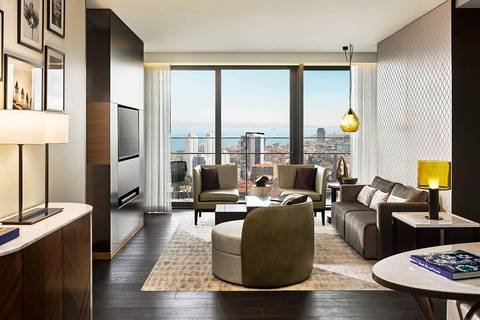 Fairmont Quasar Istanbul — living room with city view
